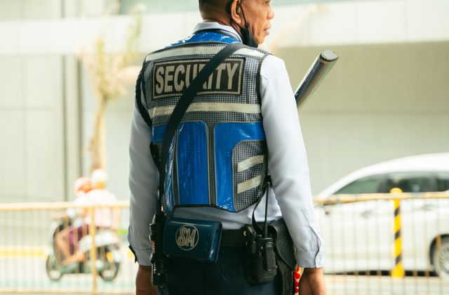 Uniformed security officer on urban patrol